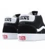 Zapatillas Vans de caña media Mid Skool negras y banda lateral blanca Unisex posterior