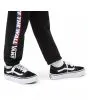 Zapatillas con plataforma Vans UY Old School en color negro con suela y banda lateral blanca para niña puestas