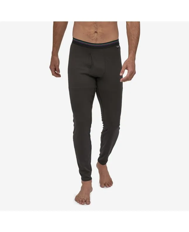 Hombre con mallas interiores Patagonia Men's Capilene Midweight Bottoms en negro