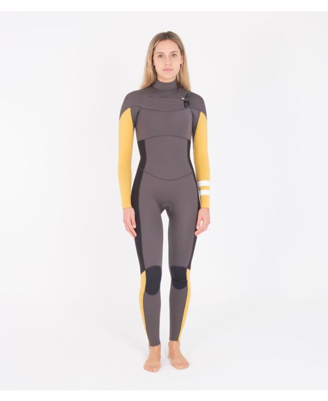 Mujer con traje de surf con cremallera en el pecho Hurley Advantage 4/3mm Marigold amarillo y gris