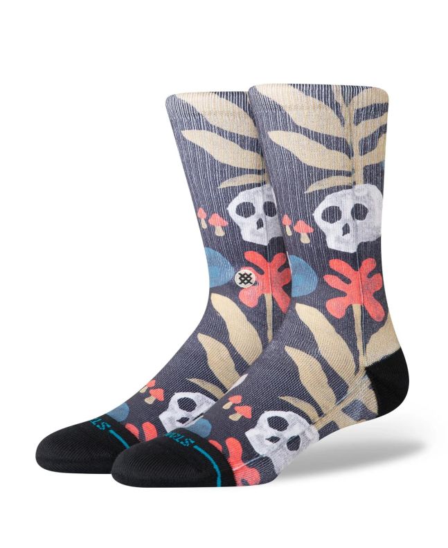 Calcetines Stance Tropiskull Crew en color negro, con diseño floral y calaveras, amortiguación media y caña media-alta
