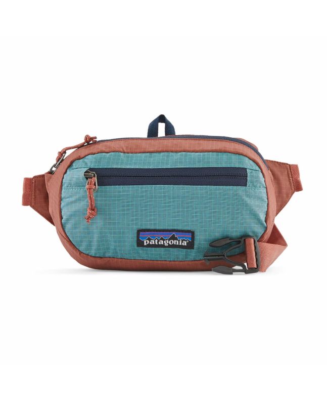 Riñonera Patagonia Ultralight Black Hole Mini Hip Pack 1L roja y turquesa Unisex
