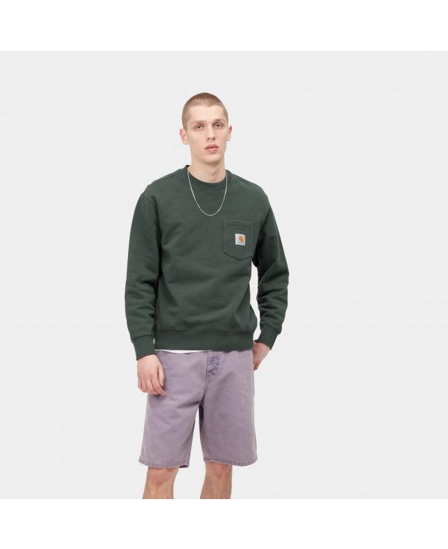 Hombre con sudadera Carhartt WIP Pocket Sweat verde 