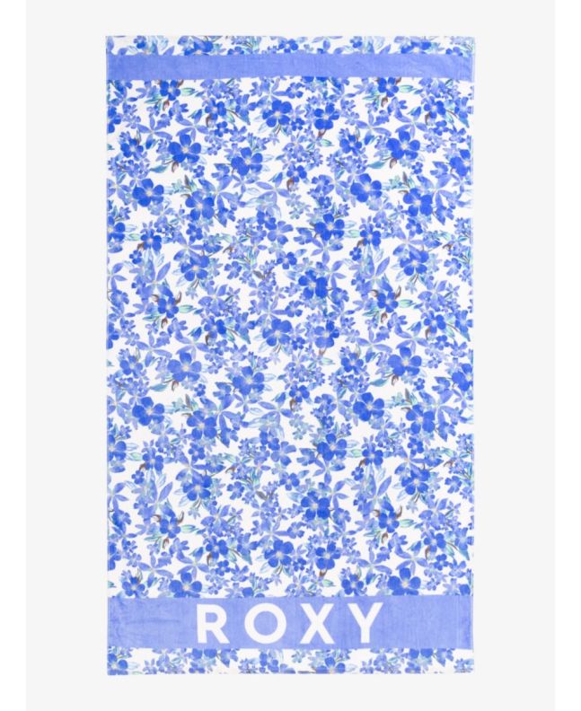 Toalla Roxy Cold Water Printed azul con flores sobre fondo blanco y logo serigrafiado 