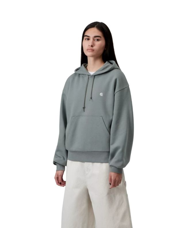 Mujer con sudadera de capucha Carhartt WIP W' Hooded Casey Verde Terciopelo con logo plateado
