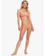 Mujer con Braguita de bikini con lazadas laterales Roxy Beach Classics coral frontal