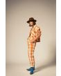 Mujer con Sobrecamisa Brixton Utopia naranja a cuadros y pantalón Bedford a juego