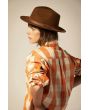 Mujer con Sobrecamisa Brixton Utopia naranja a cuadros espalda