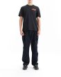 Hombre con Camiseta de manga corta Deus Canggu Surf Address Negra corte box fit