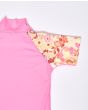 Camiseta de protección solar Rip Curl Girls UV SS rosa para niña manga