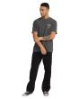 Hombre con camiseta de manga corta RVCA Lax color negro lavado ajuste relajado