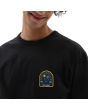 Hombre con camiseta de manga corta Vans Off The Wall con parche delantero Negra detalle patch