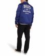 Hombre con Cazadora Deus Ex Machina Workwear Jacket 2.0 Azul Mecánico espalda