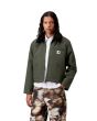 Mujer con Cazadora Carhartt WIP W' Newkirk Jacket verde con estampado interior de perro