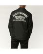 Hombre con chaqueta Deus Ex Machina Venice Coach negra 