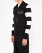 Hombre con Chaqueta de punto Deus Ex Machina Buzz Zip Thru Knit negra lateral