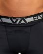 Hombre con leggins compresivos RVCA VA Sport negros cintura elástica