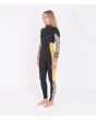 Mujer con traje de surf con cremallera en el pecho Hurley Advantage Plus 4/3mm negro y amarillo izquierda