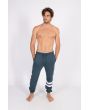Hombre con pantalón de chándal Hurley Oceancare Block Party Fleece Pant azul frontal