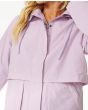 Mujer con parka impermeable Rip Curl Anti-Series Swell Lilac cremallera