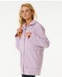 Mujer con parka impermeable Rip Curl Anti-Series Swell Lilac lateral