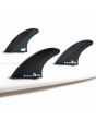 Quillas para tabla de surf FCS II Mick Fanning Neo Carbon Tri Fins en color negro y gris Talla L set