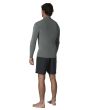 Hombre con chaqueta de neopreno Vissla Solid Sets 2mm Front Zip Jacket Moss posterior izquierda
