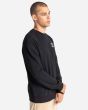 Hombre con sudadera Element The Dance negra lateral
