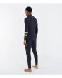 Hombre con traje de surf Hurley Plus 4/3mm Fullsuit Negro-Lemon lateral posterior