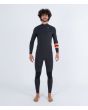 Hombre con traje de surf con cremallera en el pecho Hurley Plus 3/2mm negro grafito