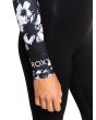 Mujer con traje de neopreno con cremallera en el pecho Roxy Elite 4/3mm negro floral logo