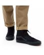 Zapatillas Vans Altas Sk8 Hi de lona negras con banda lateral sidestripe en color negro modelo puestas