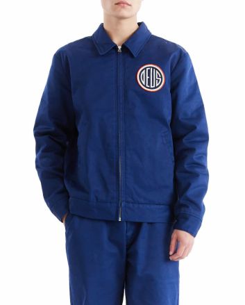Hombre con chaqueta Deus Marnus Team Jacket Estate Blue 
