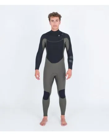 Hombre con traje de surf con cremallera en el pecho Hurley Advant 4/3mm Fullsuit verde y negro